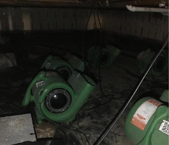 SERVPRO equipment set up in crawl space to help drying