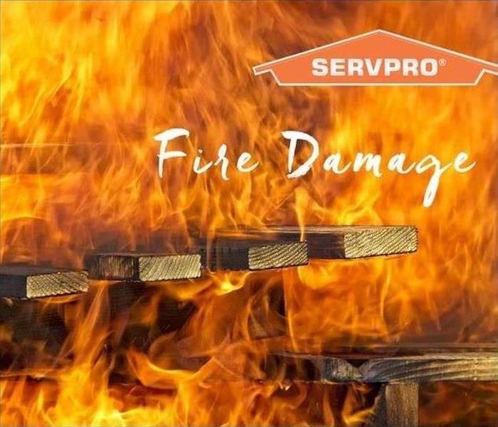flames covering all image of some boards burning up. SERVPRO logo top right with text saying fire damage under.